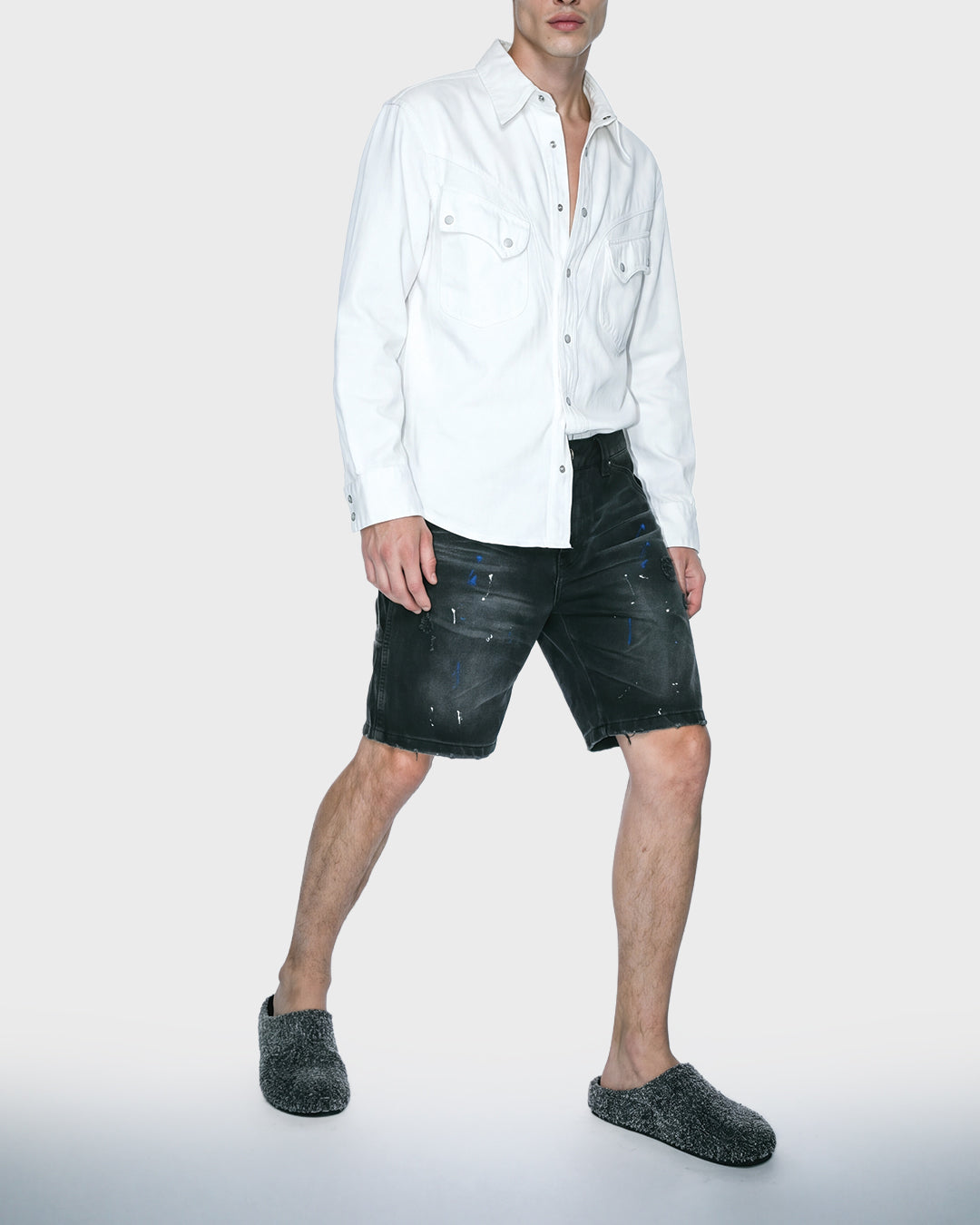 Salopette corta in denim nero