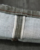 Pantalones Vaqueros de Orillo Oliva de 14oz