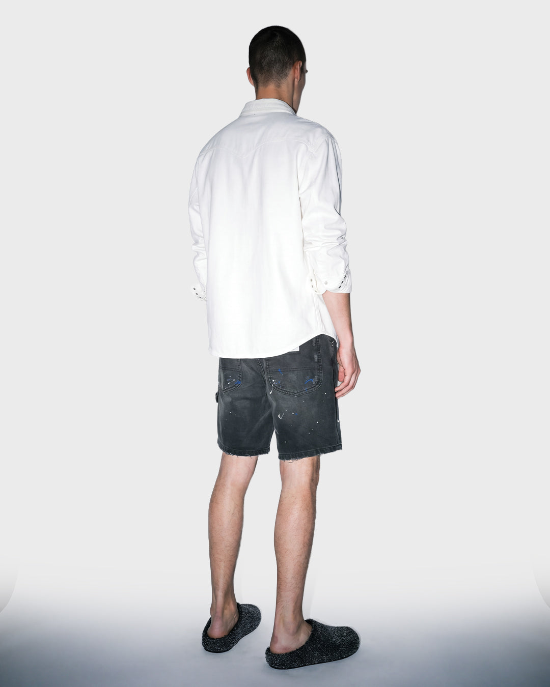 Salopette corta in denim nero