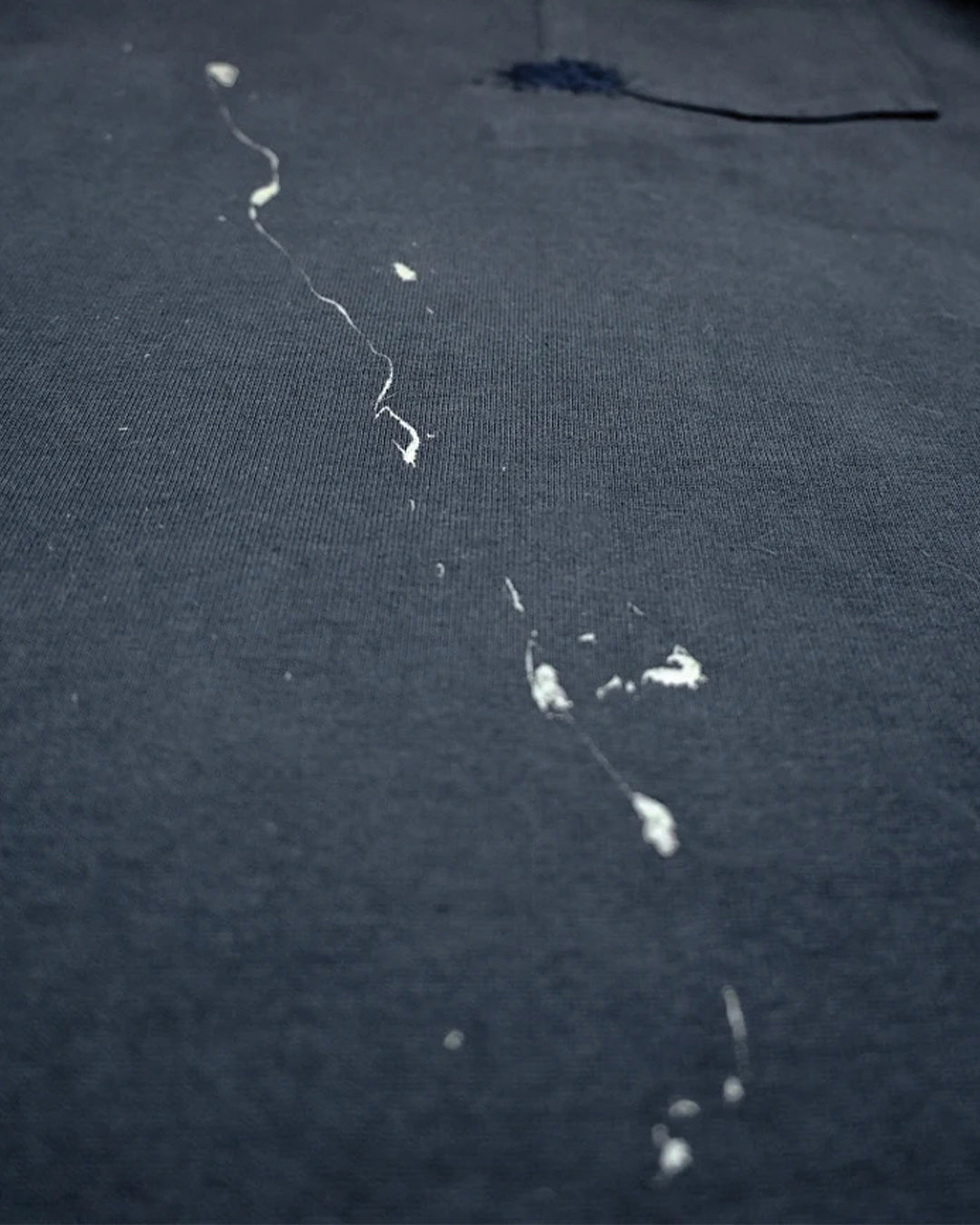 T-shirt con taschino Shibori