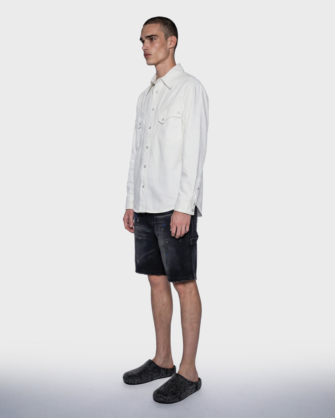 Salopette corta in denim nero
