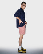 Salopette corta in denim nero