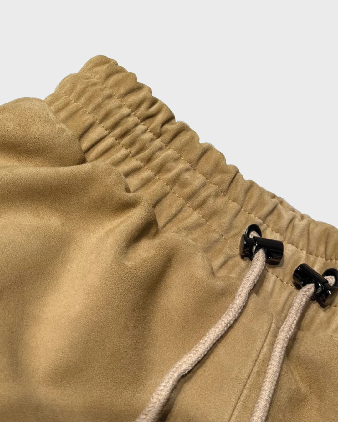 Dolphin Hem Suede Shorts