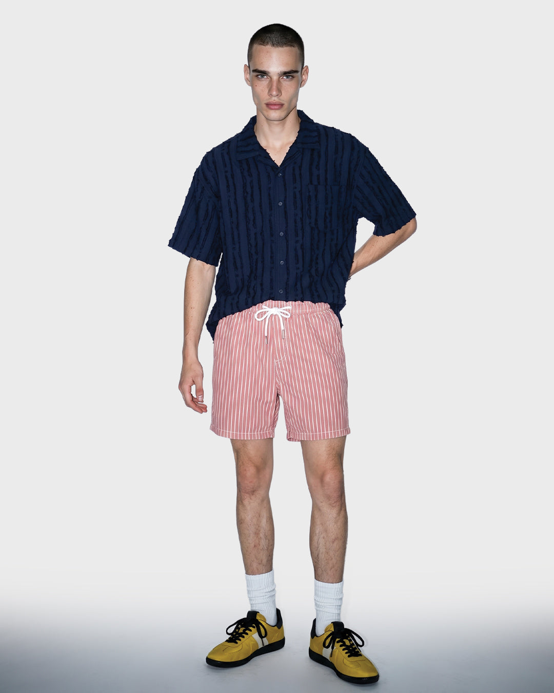 Salopette corta in denim nero