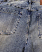 Vaqueros acampanados beige lavados