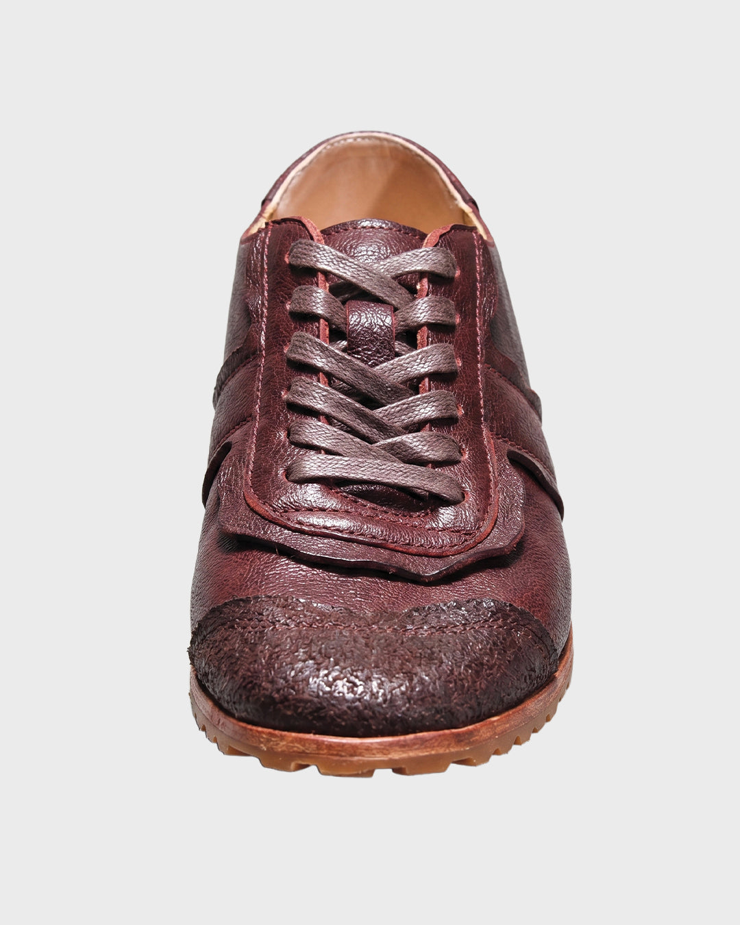 Sneaker alta in pelle con suola carrarmato