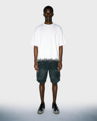 T-shirt con scritta sull'orlo