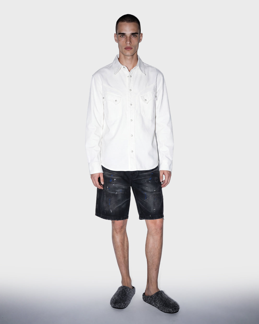 Salopette corta in denim nero
