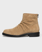 Stivale drappeggiato in pelle