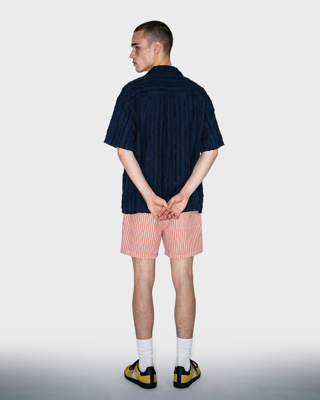 Salopette corta in denim nero