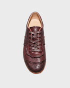 Sneaker alta in pelle con suola carrarmato