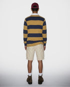 Polo de rugby dorado