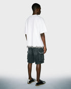T-shirt con scritta sull'orlo