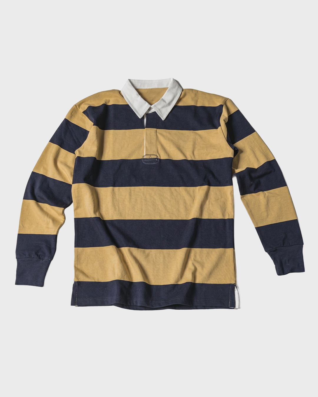 Polo de rugby dorado